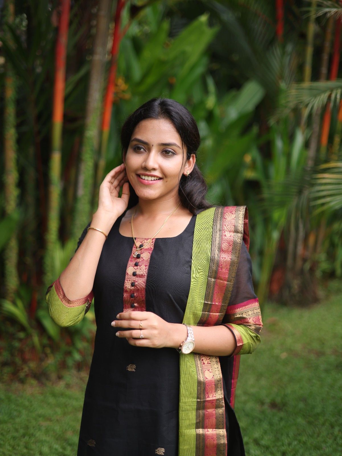 Black with Olive green rich pallu