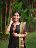 Black with Olive green rich pallu