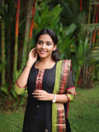 Black with Olive green rich pallu