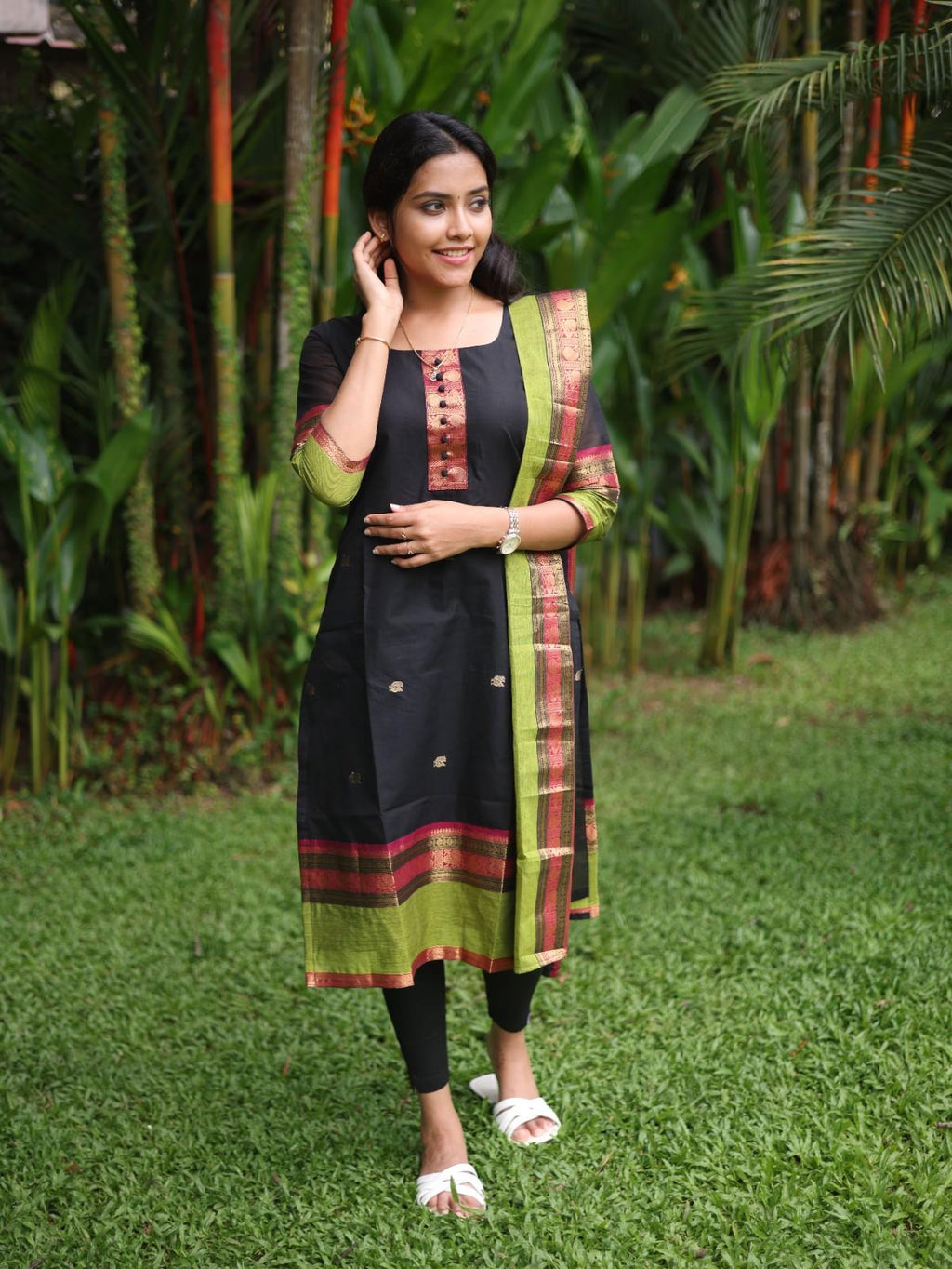Black with Olive green rich pallu