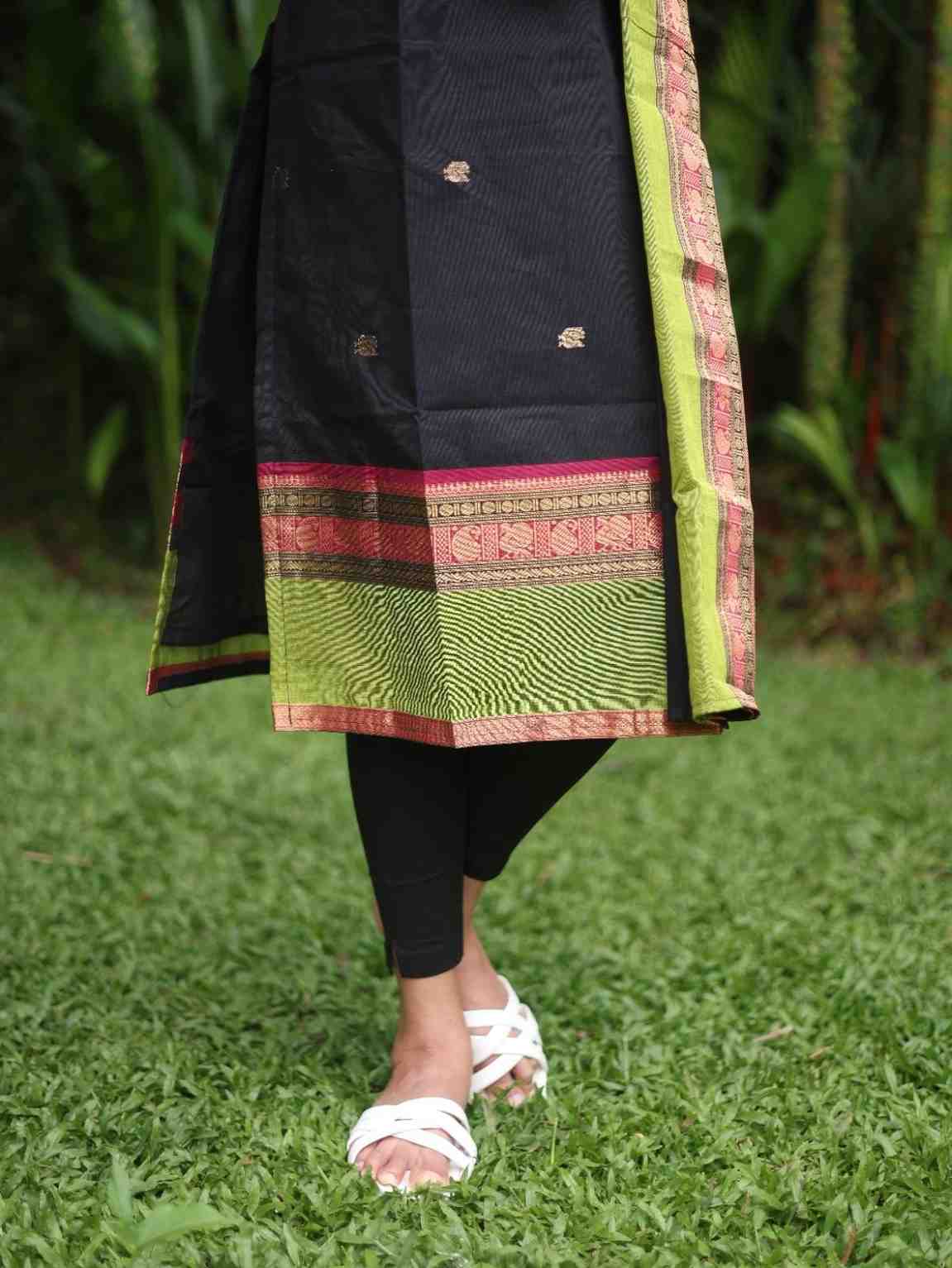 Black with Olive green rich pallu